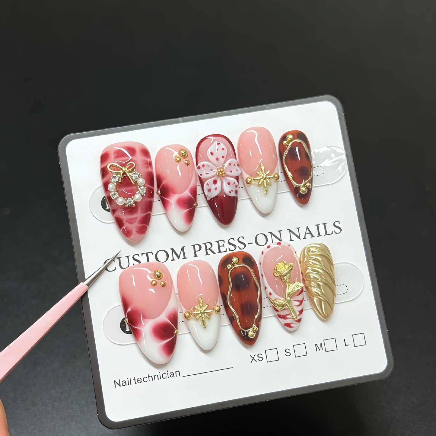 Wearing gloves is specifically for the three-dimensional engraved flower artificial nails for fake fingernails. It is for the almond-shaped wholesale in the French style manicure stickers.