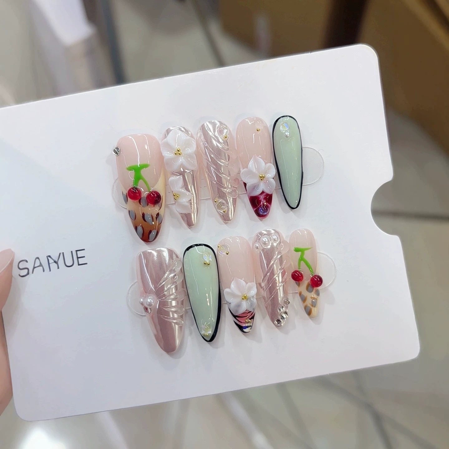 Purely handmade, re-used European-style B334 fresh and youthful handcrafted nail pieces. Three-dimensional cherry design.